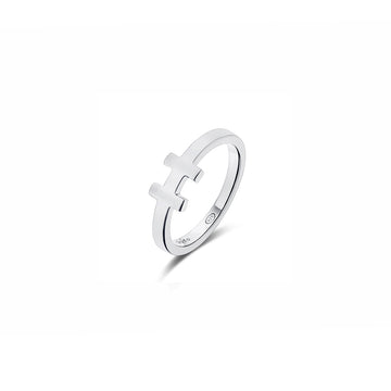 Delicate sterling silver ring featuring a unique open band design with a floating cross motif. The ring is crafted with a glossy finish, stamped with a maker's mark, and set against a white background that accentuates its simple yet symbolic elegance