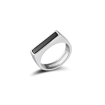 Sophisticated silver ring featuring a rectangular black onyx inset within a sleek, square-faced signet design. The ring's band is polished to a mirror finish, presenting a stark contrast with the deep black of the onyx, set against a white background for a modern, stylish look