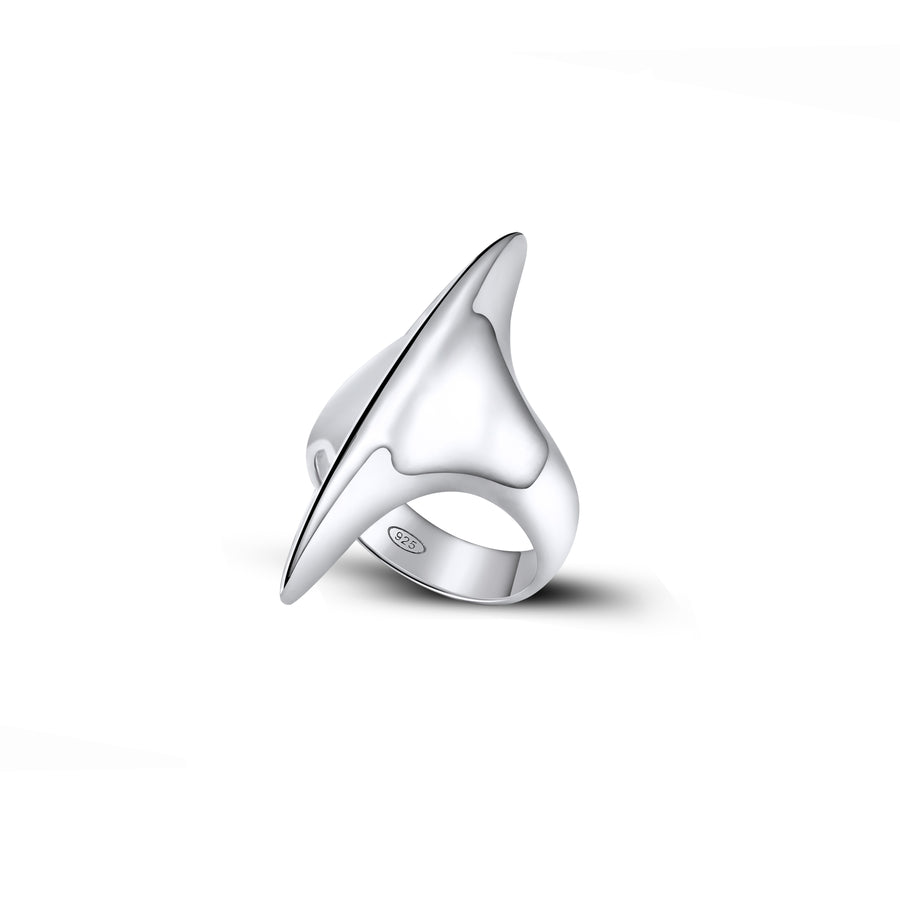 Modern sterling silver ring featuring a sleek, asymmetrical design with a polished finish. The band smoothly tapers into a pointed tip, creating a distinctive, sculptural form that embodies contemporary elegance